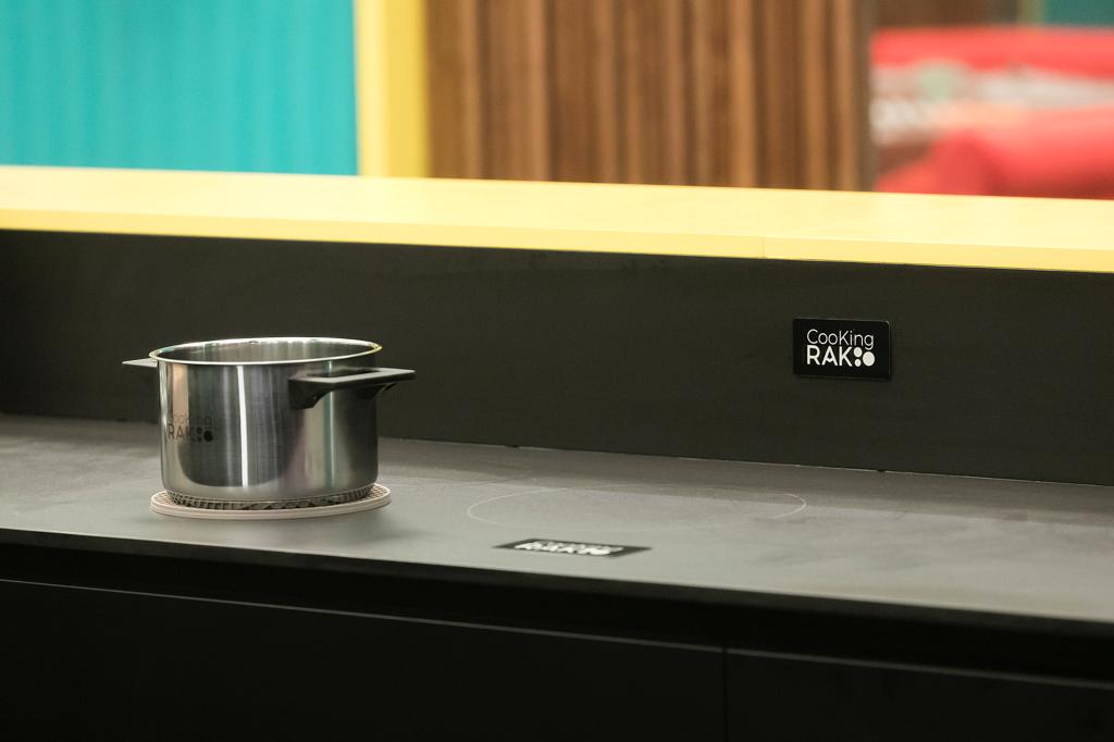 gran hermano cooking surface fuego